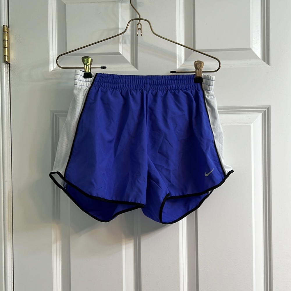 Purple Nike DriFit shorts